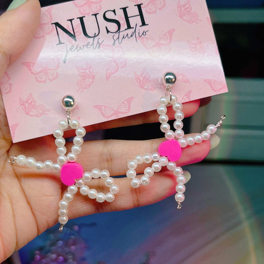 Pink heart bow earrings